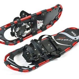 A pair of black and red snowshoes designed for winter hiking.
